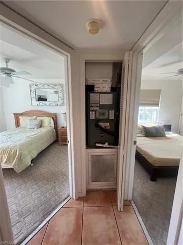 Hallway with light carpet