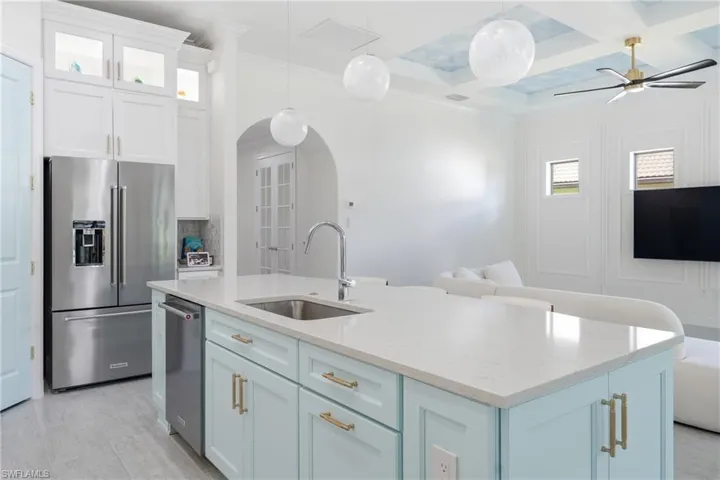 Updated kitchen with freshly painted cabinetry and modern finishes