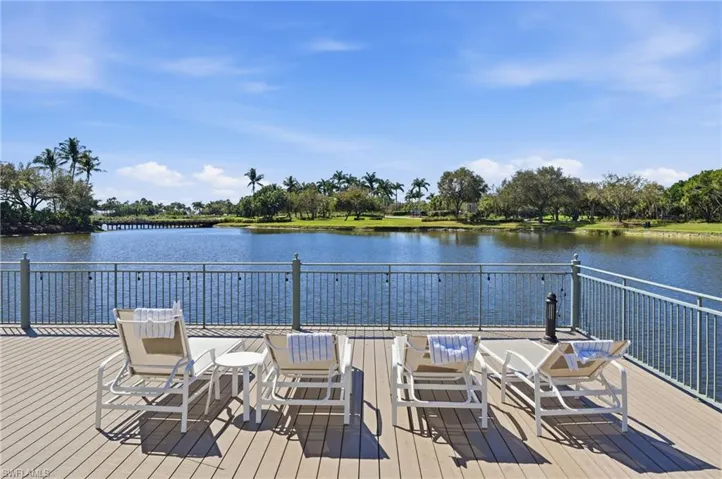 Community deck with chairs overlooking the surrounding landscape, creating a quiet place to unwind within the community.