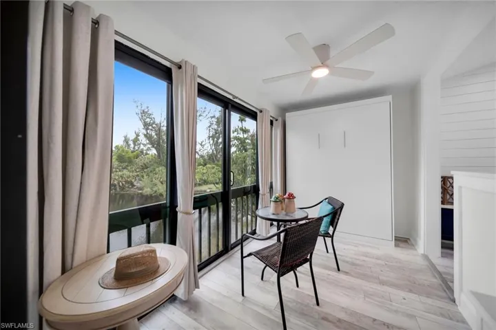 Enclosed sunroom with Murphy Bed Folded Enormous water view