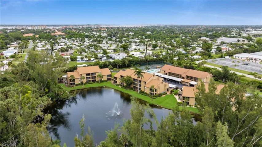 Aerial view of stocked lake and close distance to Caloosahatchee River leading to Sanibel Island