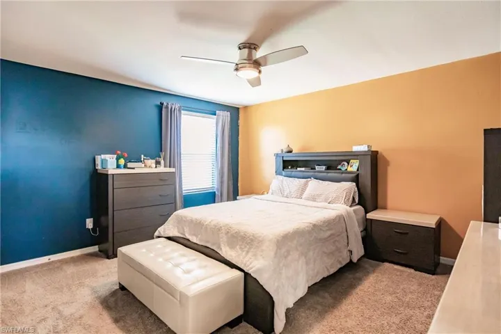 Bedroom with carpet floors and ceiling fan