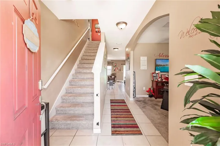 Foyer with tile flooring