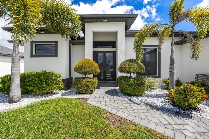 Front Entry with lush landscaping