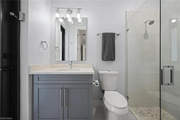 Third bathroom that serves as a convenient pool bath