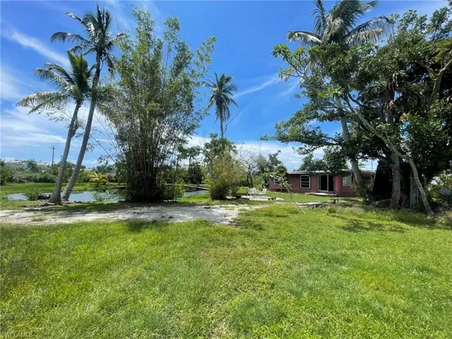 View of yard featuring a water view