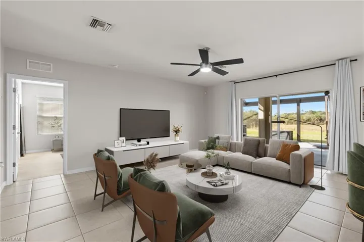 Tiled living room with ceiling fan