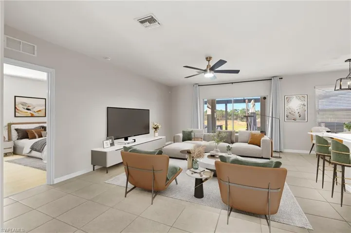 Tiled living room with ceiling fan