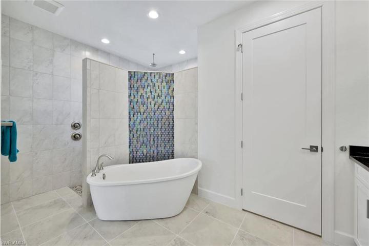 Master bathroom/ soaking tub and large walk in shower.