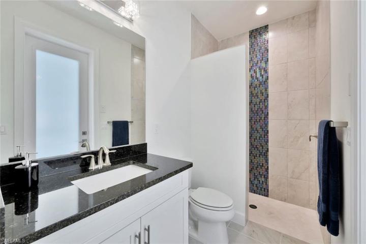 Attached bath to 2nd guest bedroom. Also the pool bath.