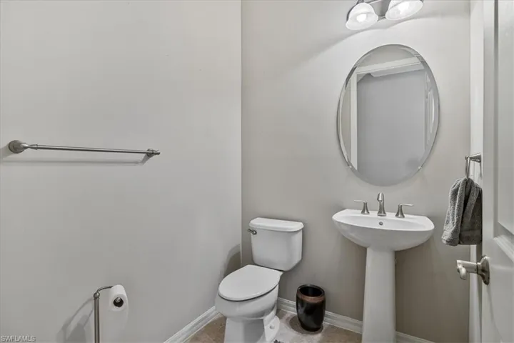 Bathroom featuring toilet and sink