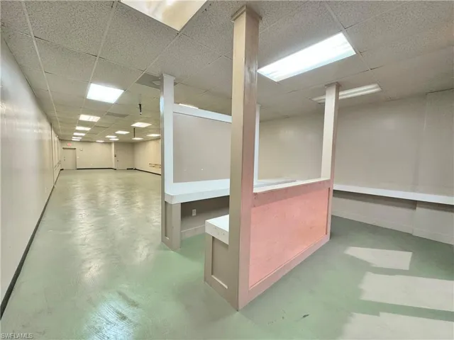 Basement with a paneled ceiling