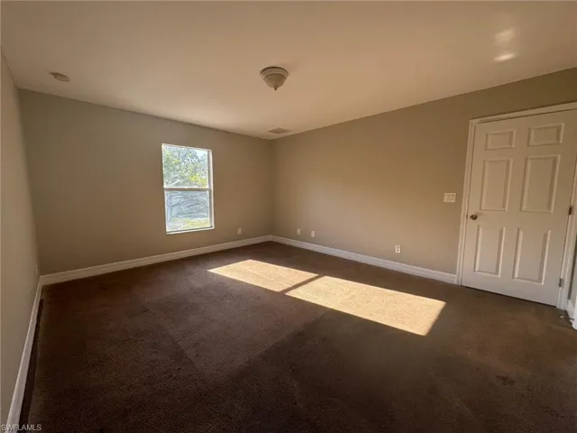View of carpeted spare room