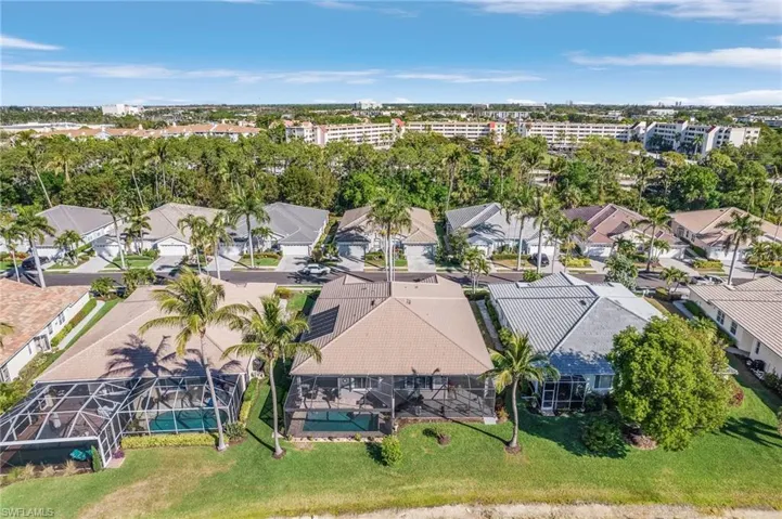Birds eye view of property with a residential view