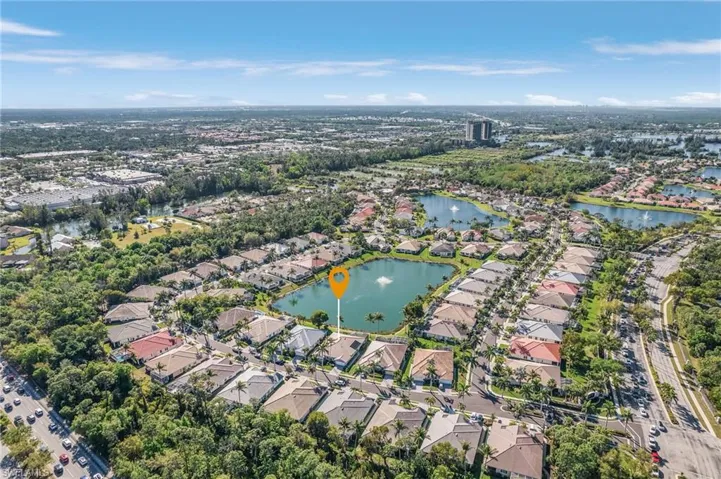 Bird's eye view with a residential view and a water view