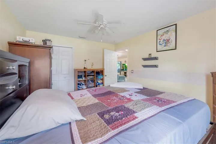 Bedroom featuring a closet and ceiling fan