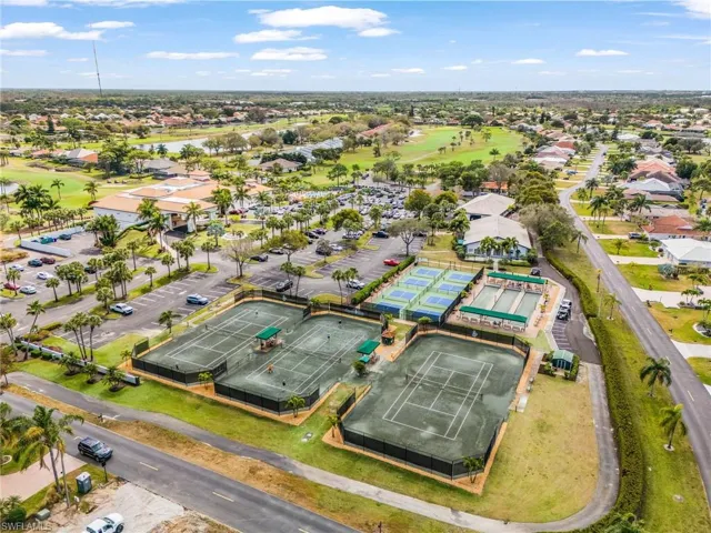 Aerial perspective of suburban area with a local golf course