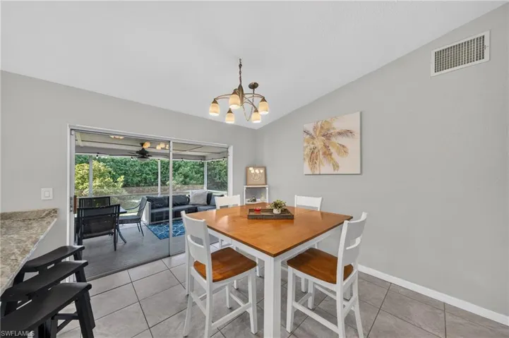 Bright interior featuring tile flooring and a built-in countertop