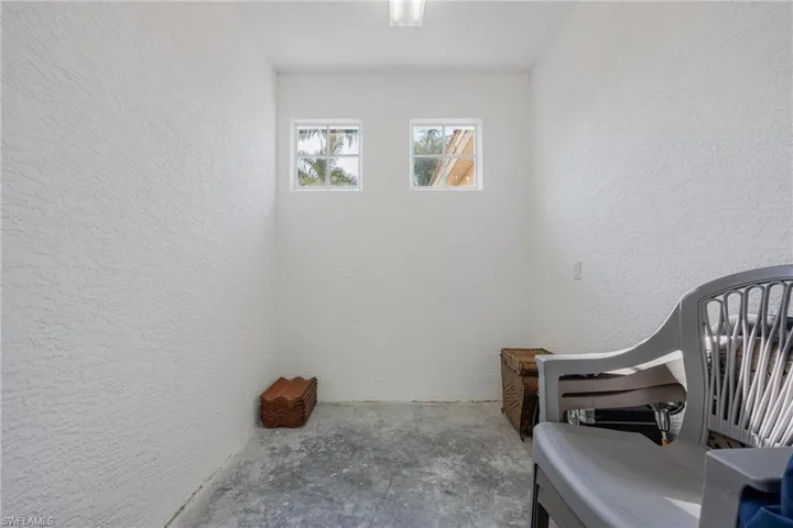 Living area with concrete flooring