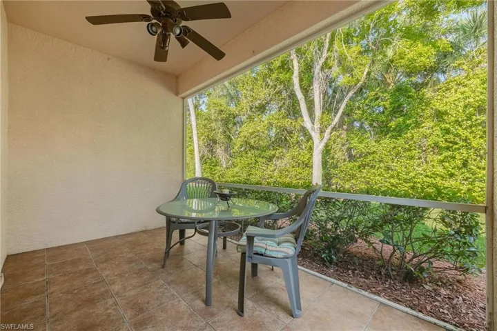 Sunroom featuring ceiling fan