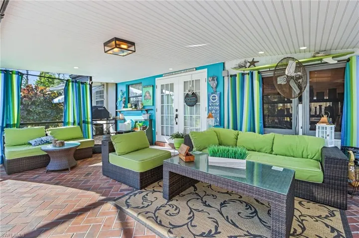 Relax and lounge around the pool screened lanai.