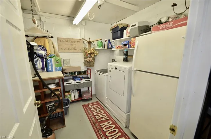 Separate Laundry in back of the garage.