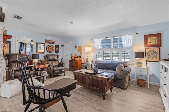 Wood-like flooring and tongue and groove ceilings.