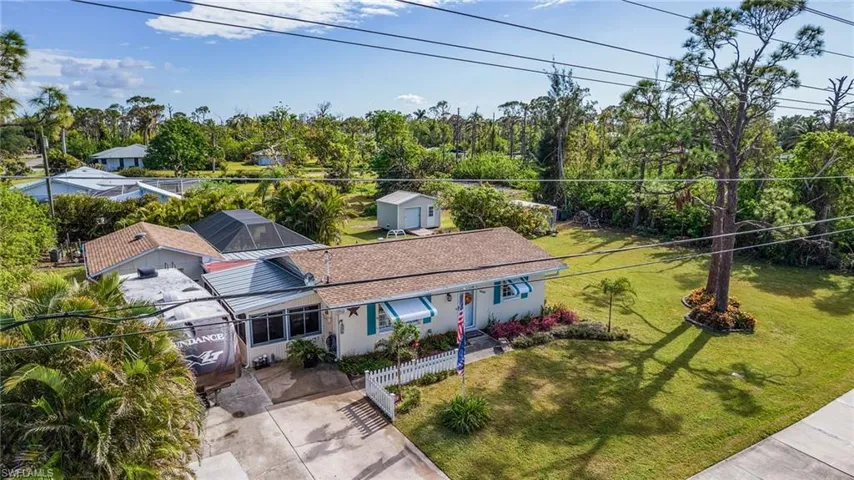 Aerial of home and additional lot.
