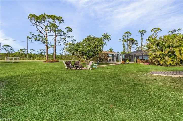 The fire pit sits on a separate lot.  If you don't want that much space, just sell the extra lot.
