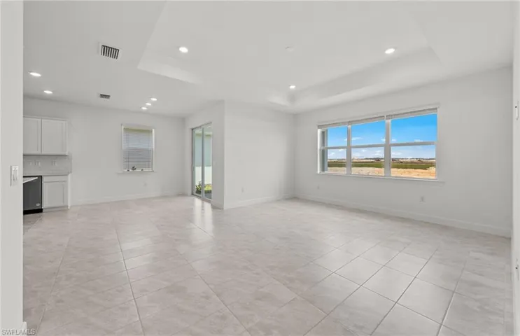 Gathering room - Tray ceiling & tons of natural light