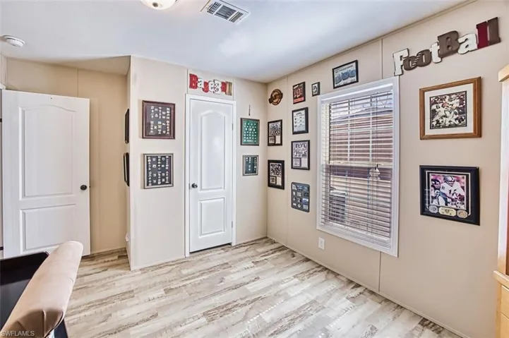 Office space with light wood-style floors