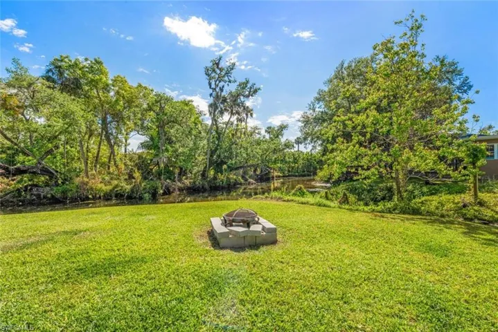 View of yard featuring a fire pit