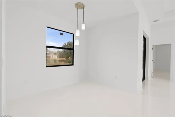 Spare room featuring tile patterned flooring