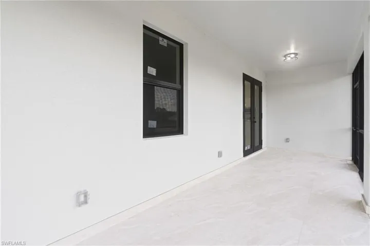 Spare room with tile patterned floors