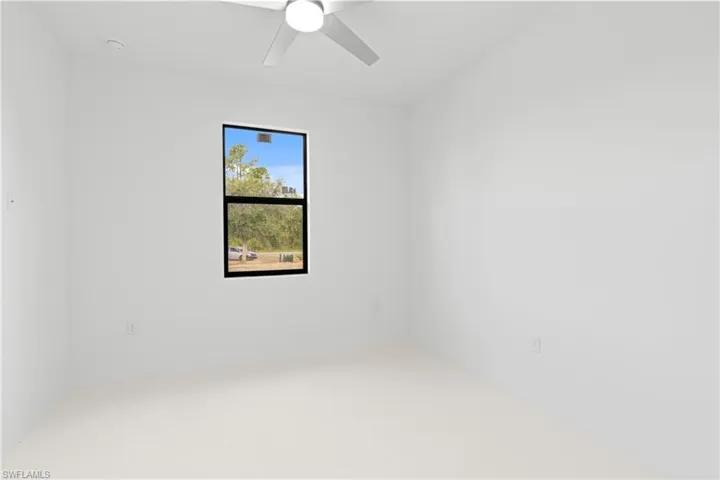 Spare room featuring ceiling fan
