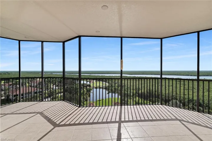 Unfurnished sunroom featuring a water view and healthy amount of natural light