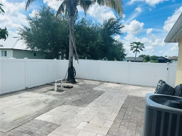 View of patio with central air condition unit