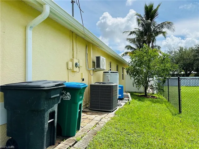 View of yard featuring central air condition unit