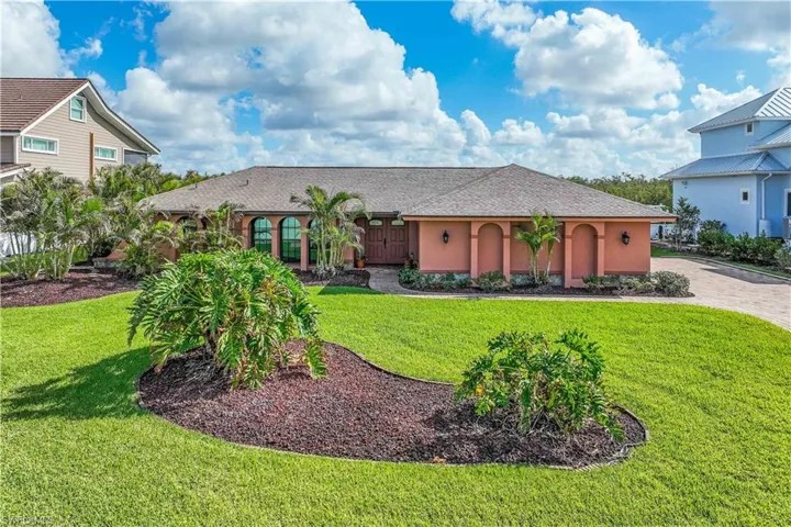 View of front of home featuring a front yard