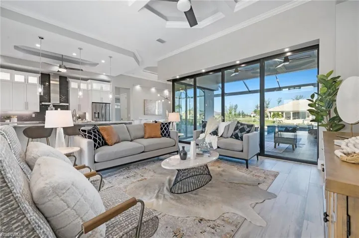 Living area overlooks lanai & pool