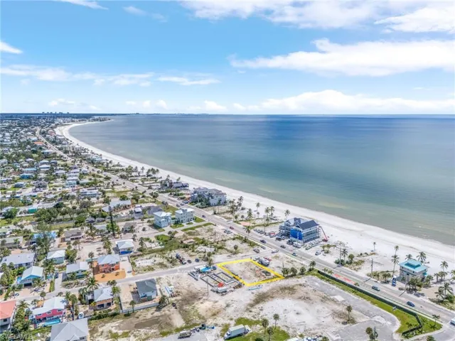 View of property location with waterfront with a beach and property boundaries highlighted