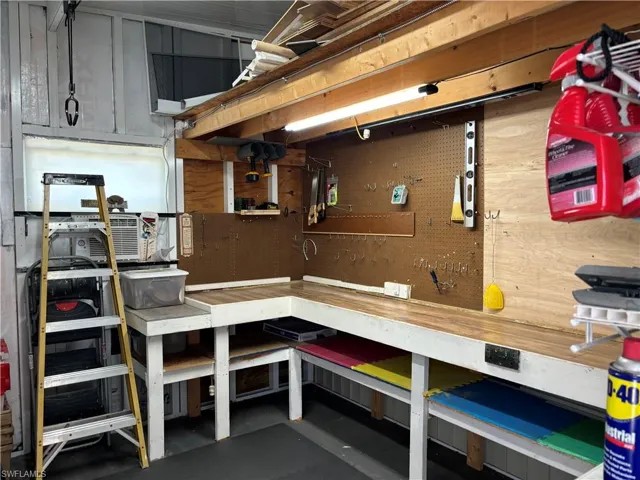 Basement featuring a workshop area