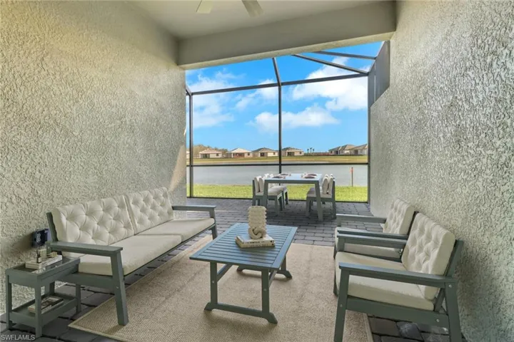 Virtually staged screened patio/lanai.