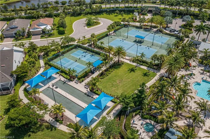 Aerial view of property's location featuring a pool