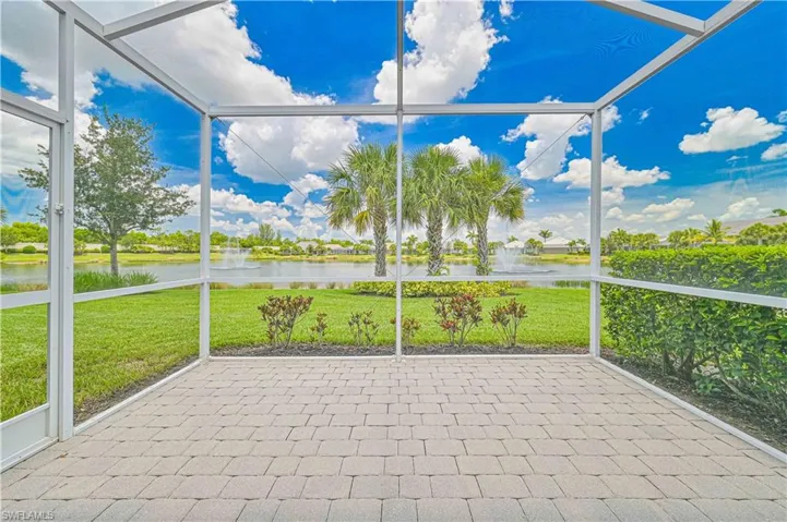 Unfurnished sunroom with a water view