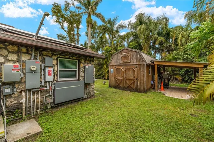 View of yard with a shed
