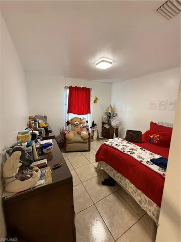 View of tiled bedroom
