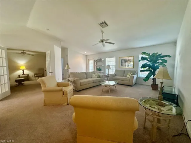 Great Room with view into Den towards front door.