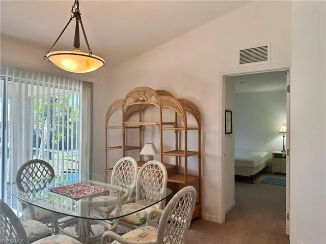 View of Dining area featuring door leading to Bedrooms, Jack & Jill, and Den