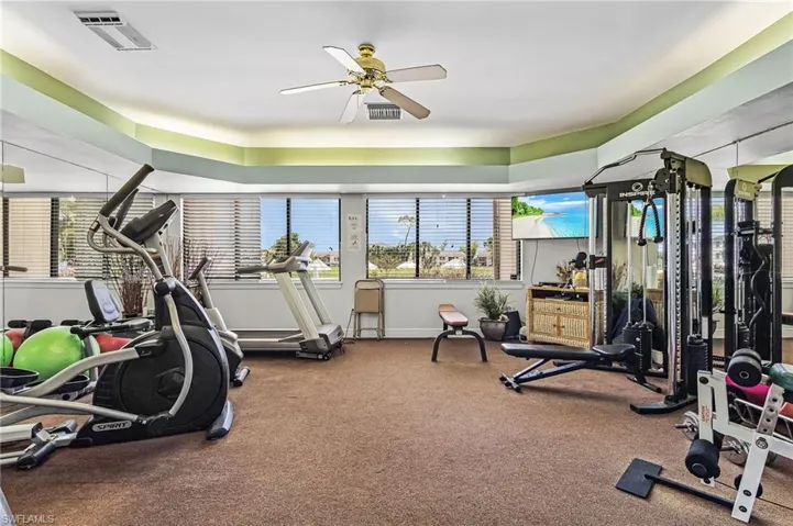 Workout area with a ceiling fan